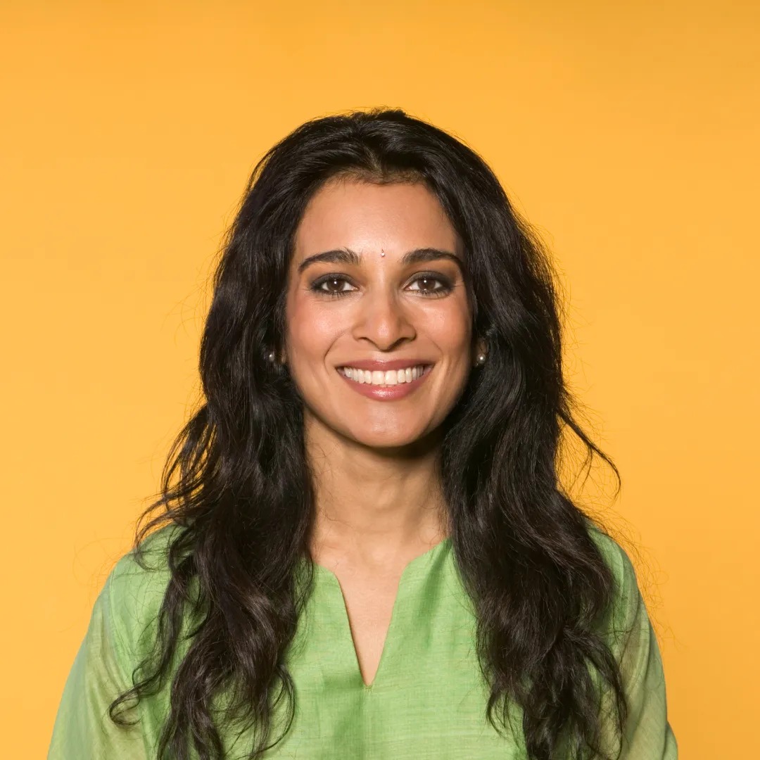 A generic picture of a woman smiling.