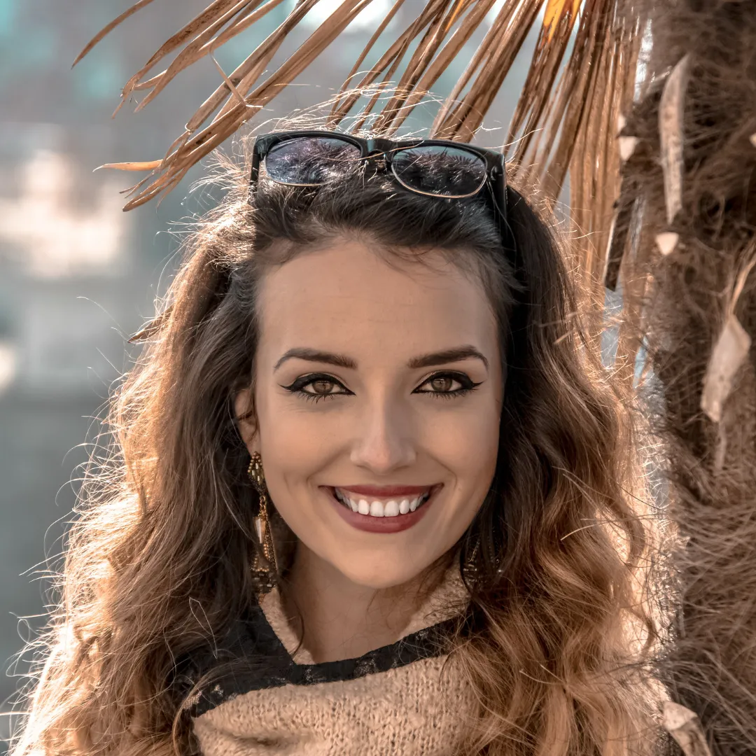 A generic picture of a woman smiling.