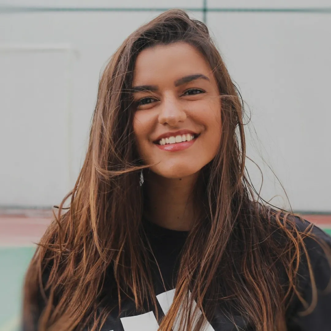 A generic picture of a woman smiling.