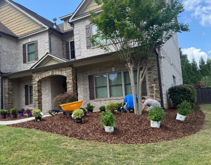 Courtyard with potted plants and seating area.