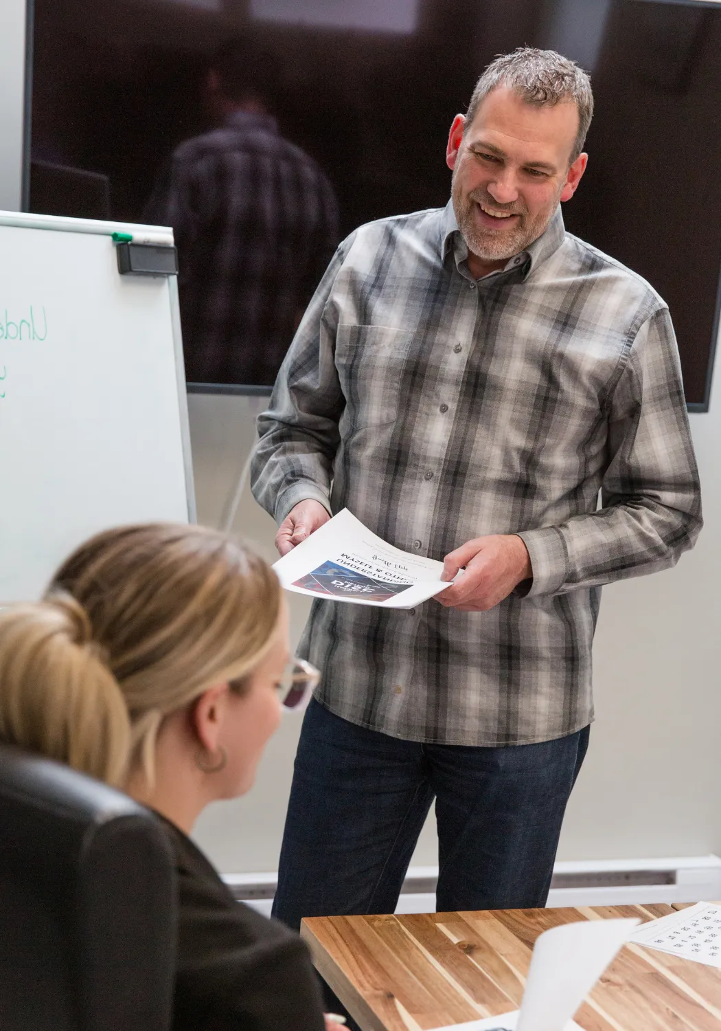 Workplace chaplain Garth Epp leading bible study at work