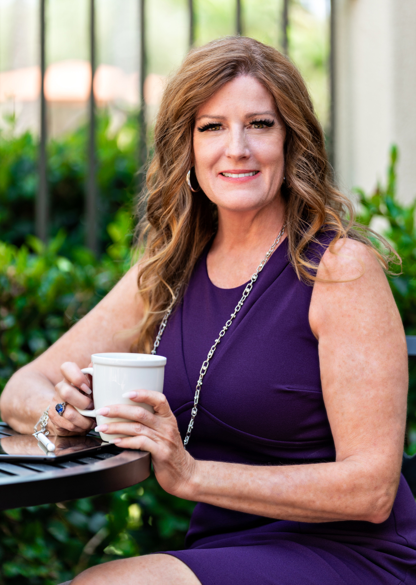 Marcia Riner — professional female business leader in a bright modern office