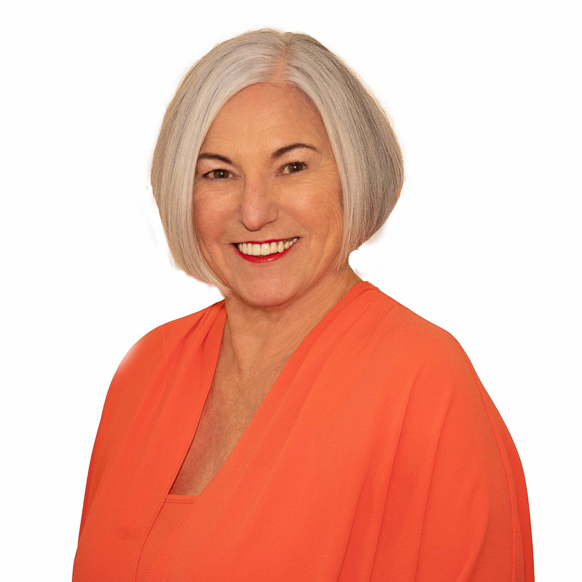 A 1:1 portrait of the author, a middle-aged woman with warm brown skin and curly dark hair, seated in a sunlit study surrounded by ancient books and glowing orange artifacts, exuding wisdom and calm.