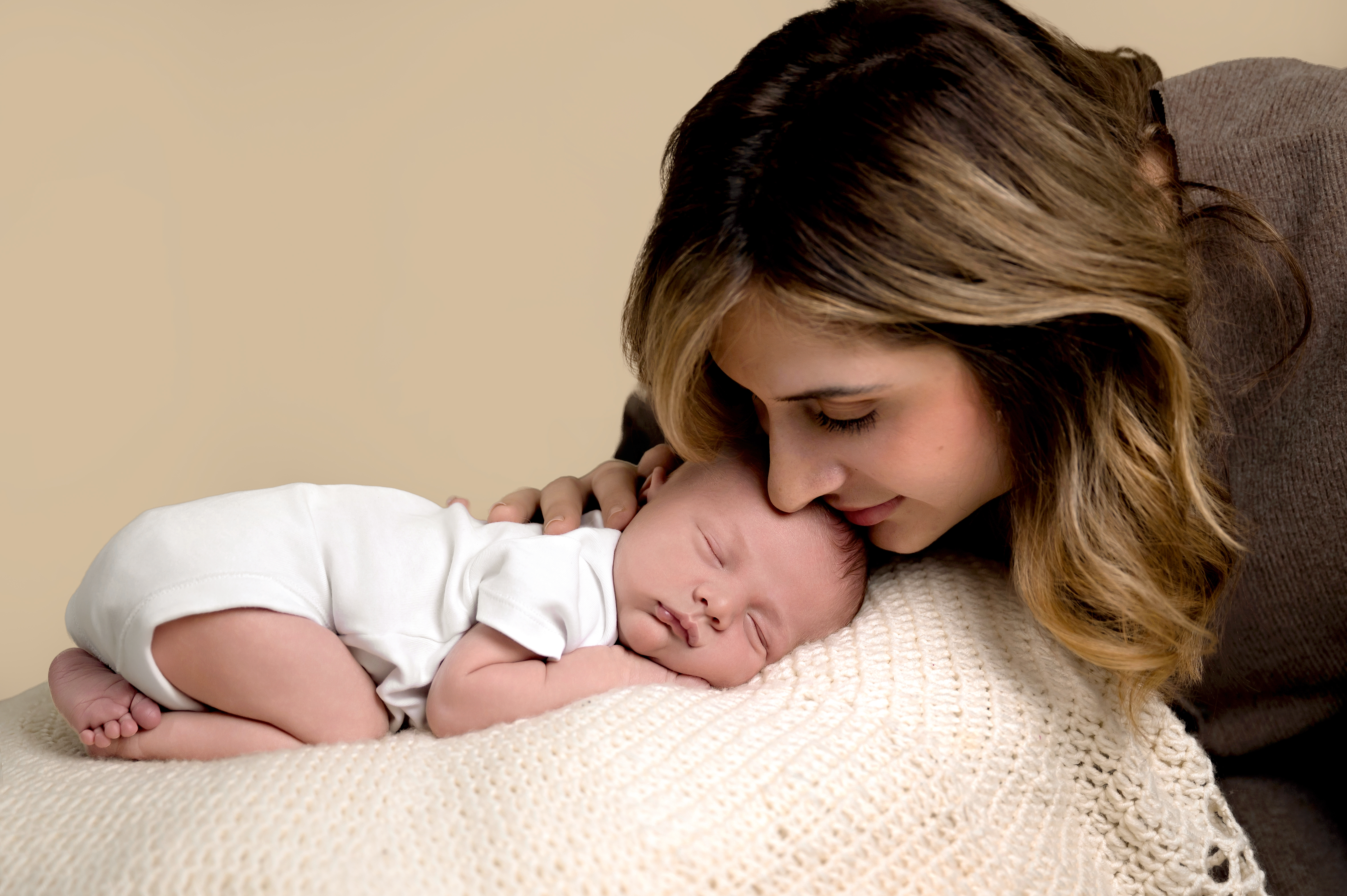 Newborn baby sleeping peacefully during studio session