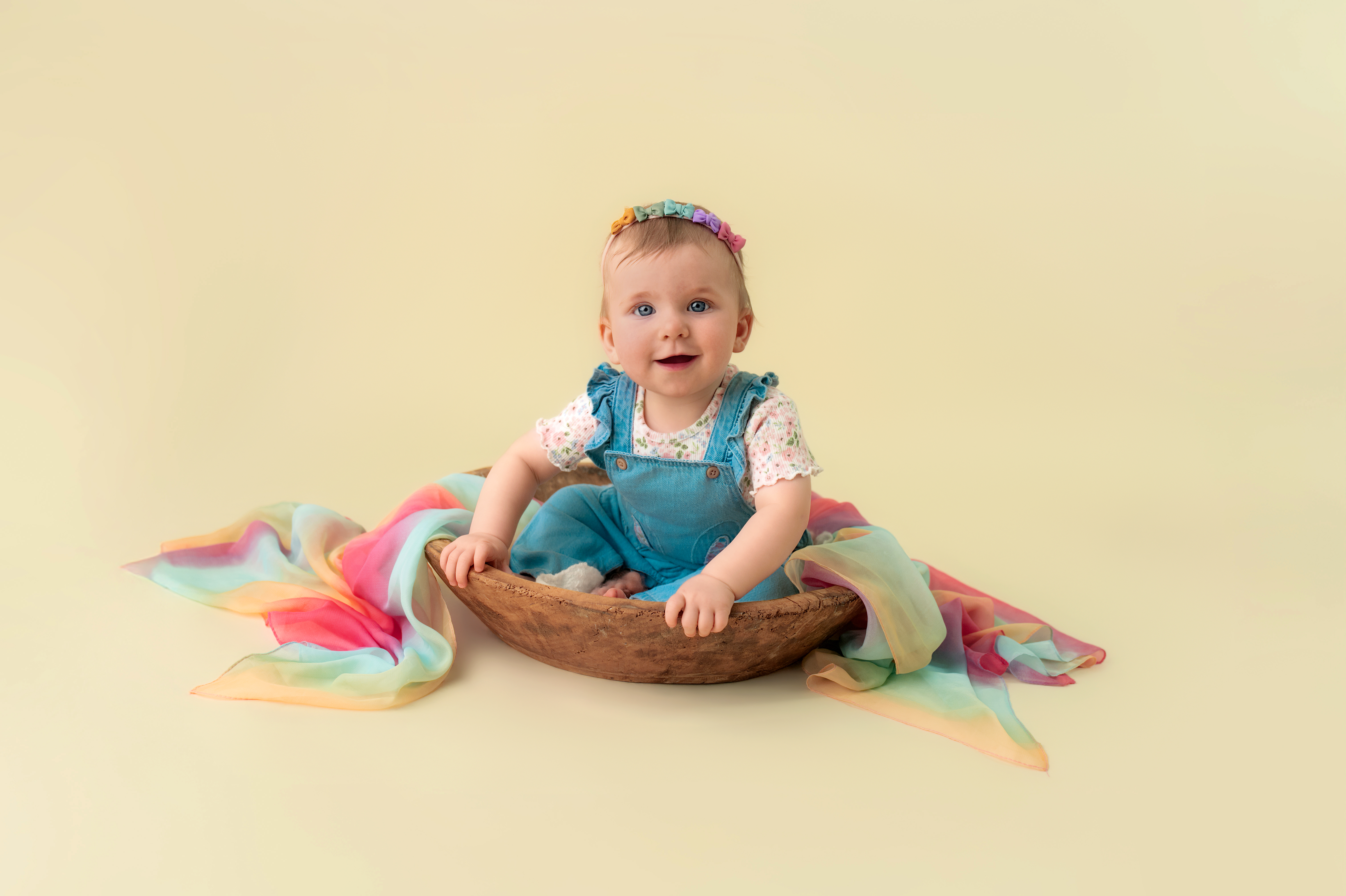 Happy sitting baby exploring their surroundings