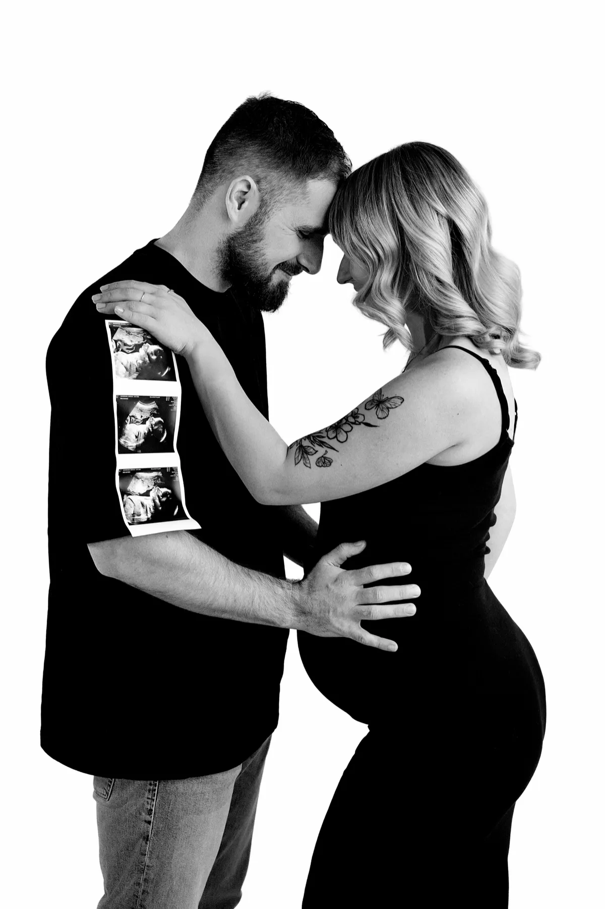 Customer portrait of Hannah smiling with her baby boy George