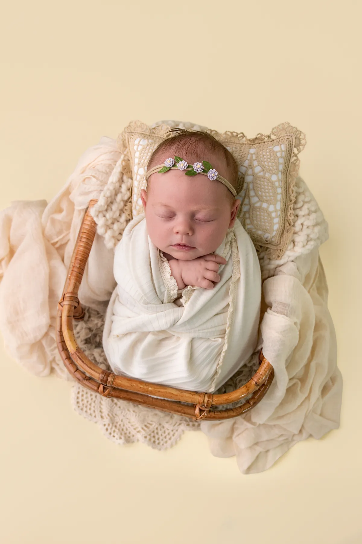 Customer portrait of Rebecca smiling with baby Leo