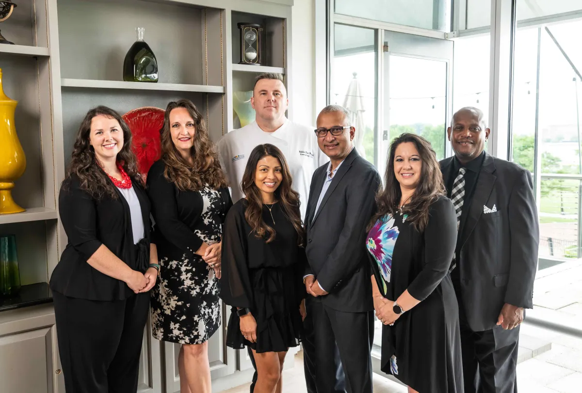 Group Photo of employees at Town Point Club in Norfolk, VA