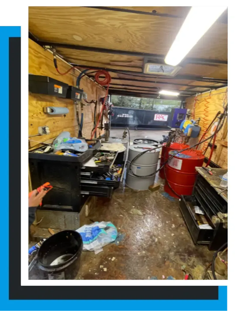 Used spray foam rig interior with chemical drums, hoses, and tools shown before refurbishment by Spray Tech Services, Panama City FL