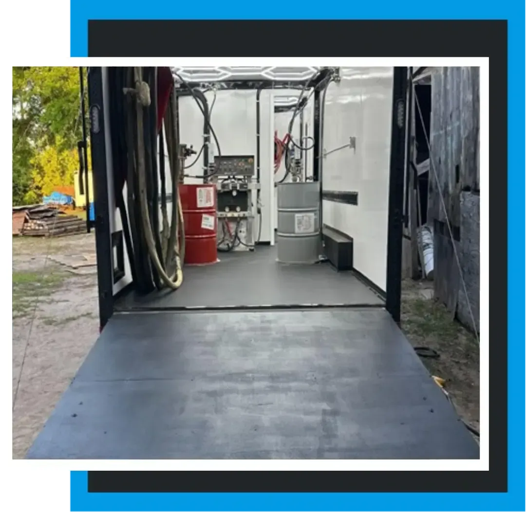 Completed spray foam rig with LED lighting, hose system, and drum setup by Spray Tech Services in Panama City, FL