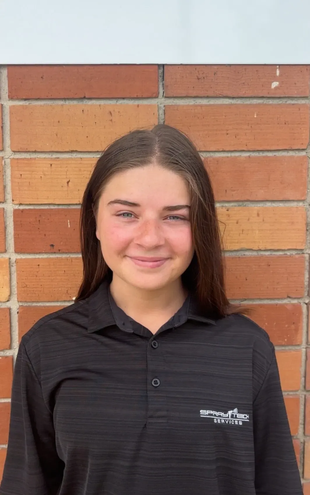 Gracie Woolsey, Marketing Manager at Spray Tech Services in Panama City, FL, balancing academic and industry expertise