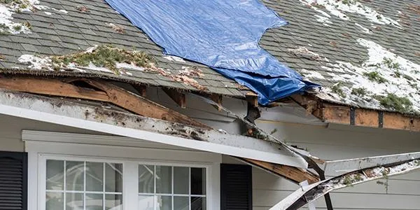 damage house roof before image