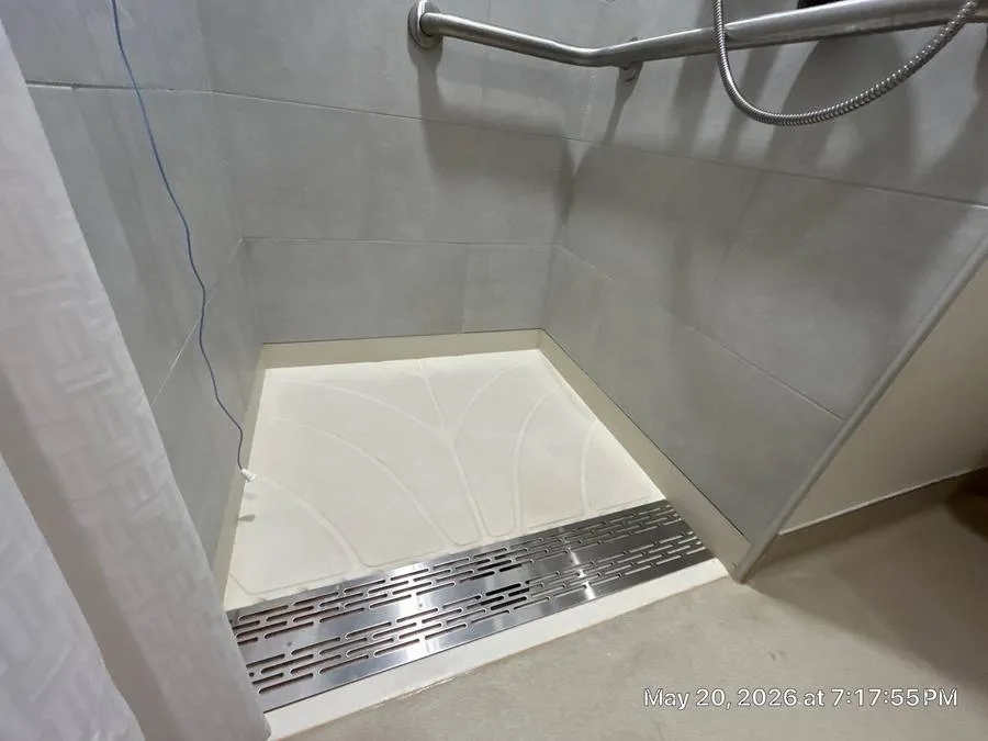 Custom shower remodel with linear drain and modern tile