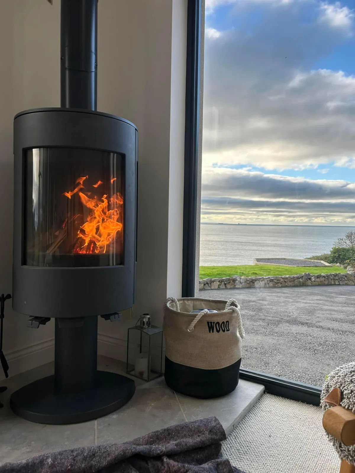 a window with a view of a snowy mountain