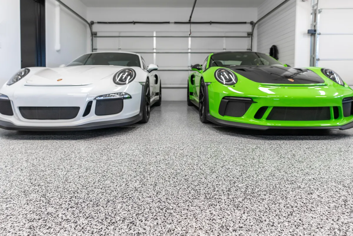 custom garage floor coating with sports cars