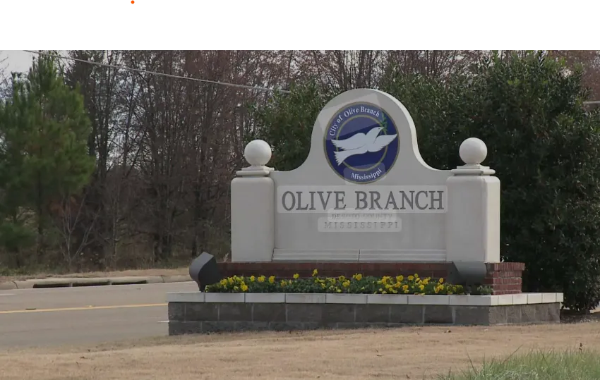 Cedar porch and deck addition for a historic home in Old Towne Olive Branch