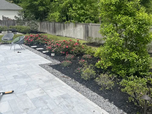 Recent landscaping work showing flower beds