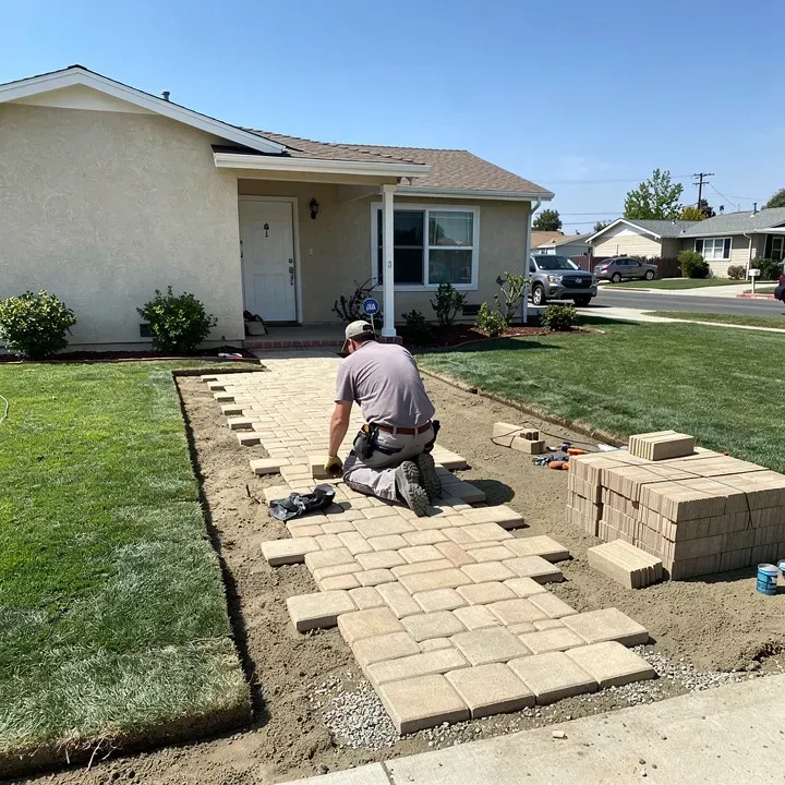 Paver walkway installation in progress in front of a home in Rosemead, California