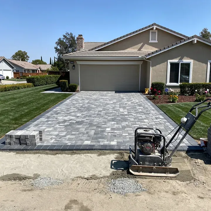 Paver driveway installation in progress in front of an upscale home in Rosemead, California