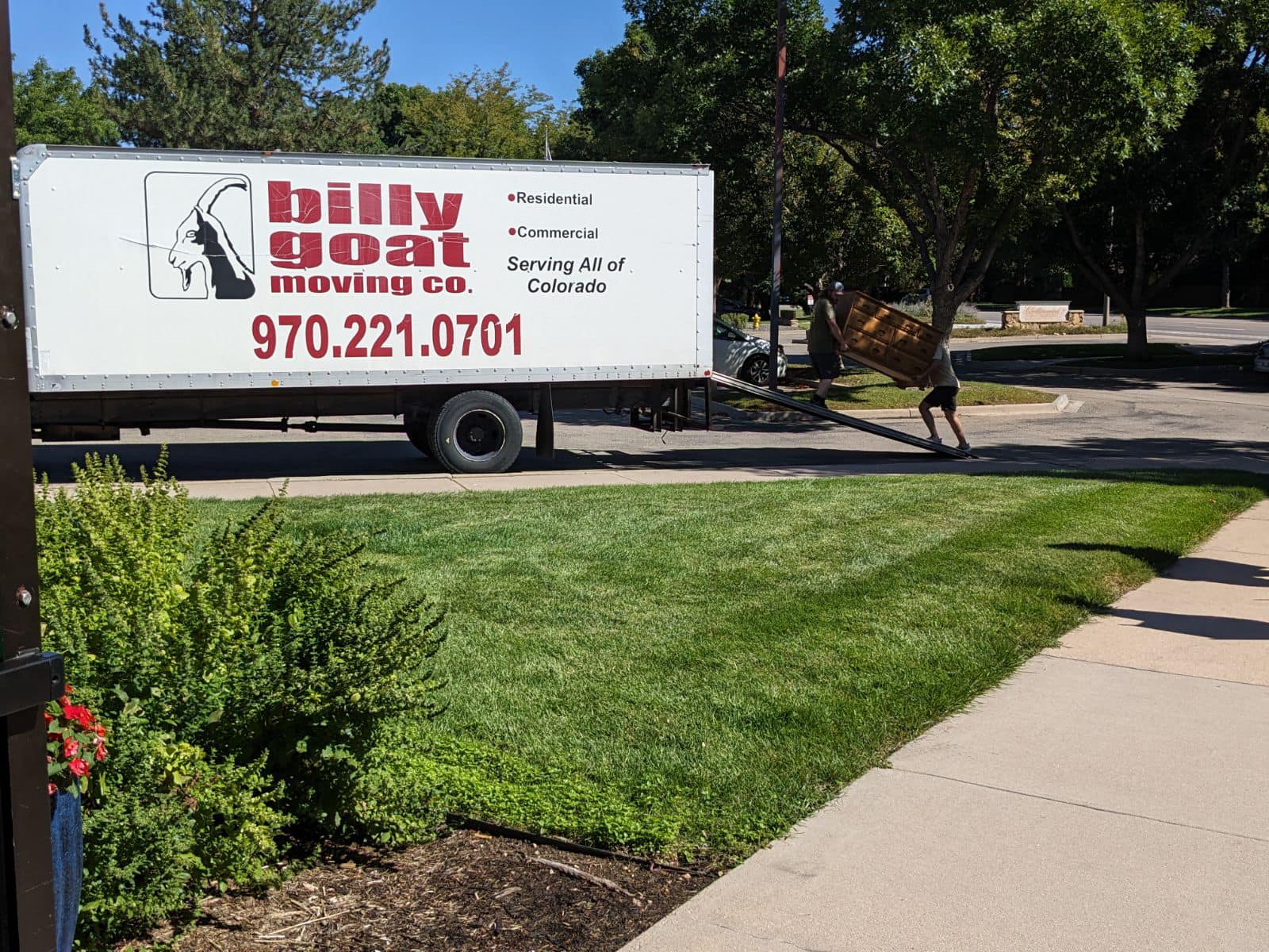 Billy Goat Moving truck parked in front of a Fort Collins home during a residential move