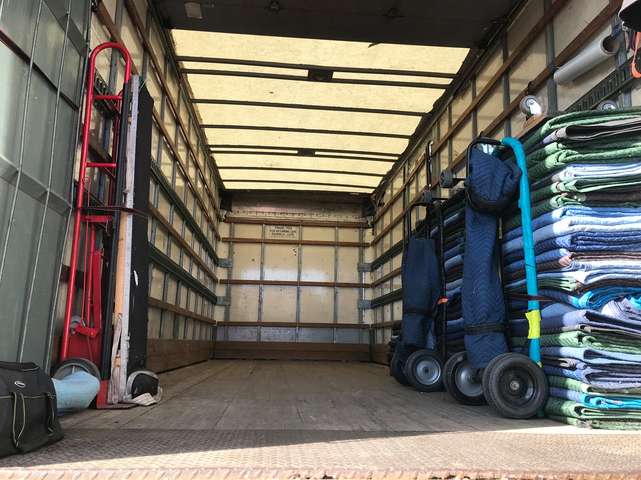 nterior of Billy Goat Moving truck showing safely packed furniture and moving boxes for Fort Collins move