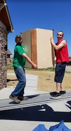 Fort Collins moving company crew loading furniture during a professional residential move