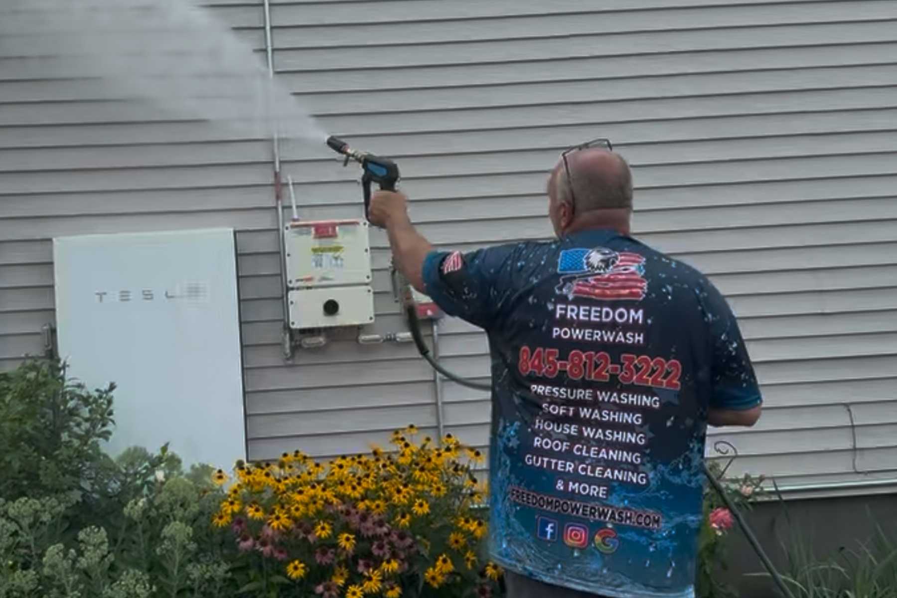 Freedom Powerwash soft washing vinyl siding in Mt. Marion NY near Tesla Powerwall