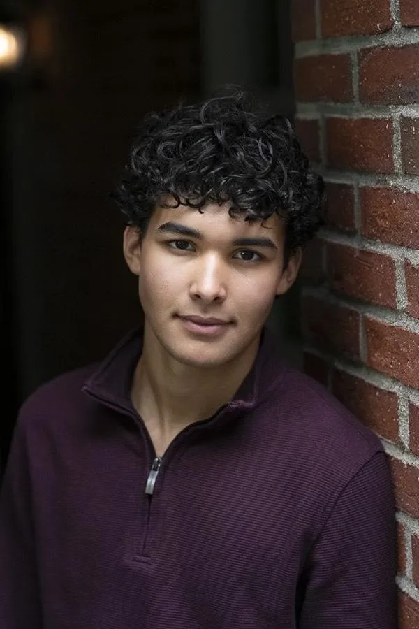 Portrait of Mr. Charles in a creative studio environment