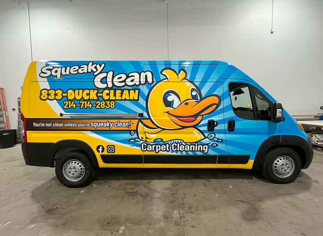 Yellow Squeaky Clean carpet cleaning wrapped van.