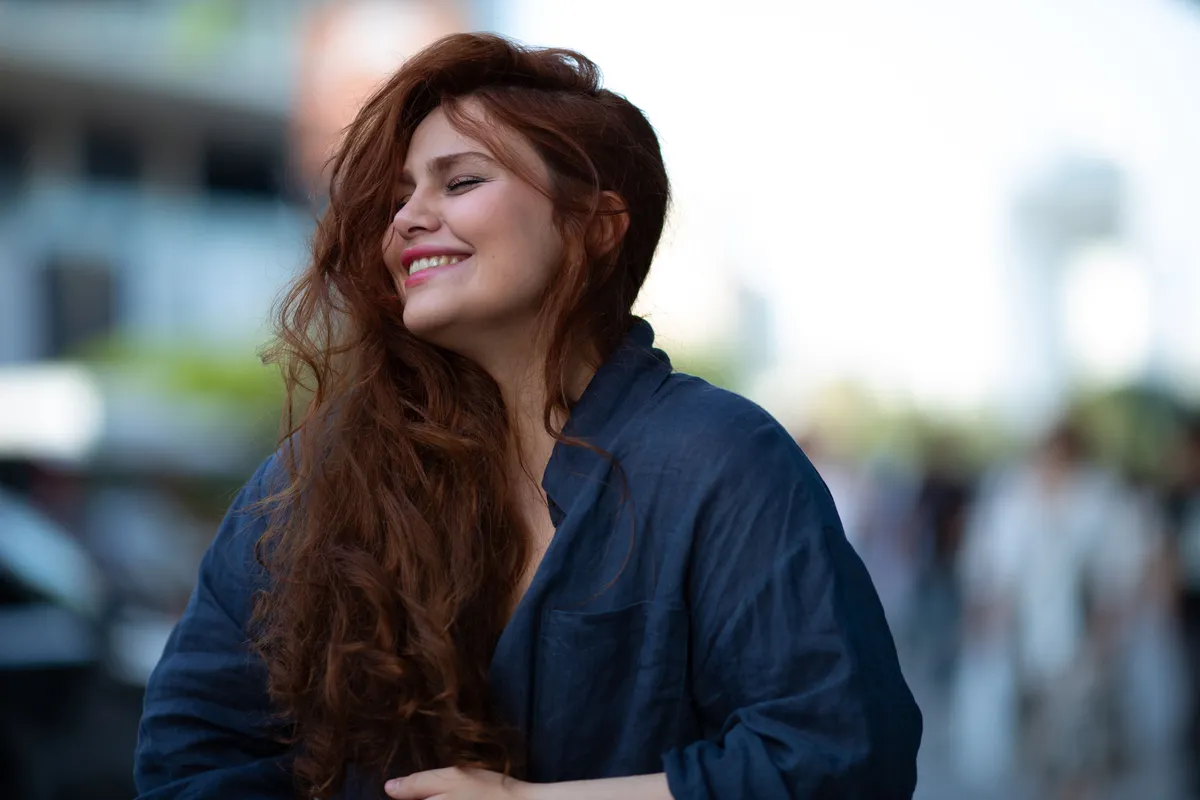 Woman feeling calm and confident after working through relationship patterns