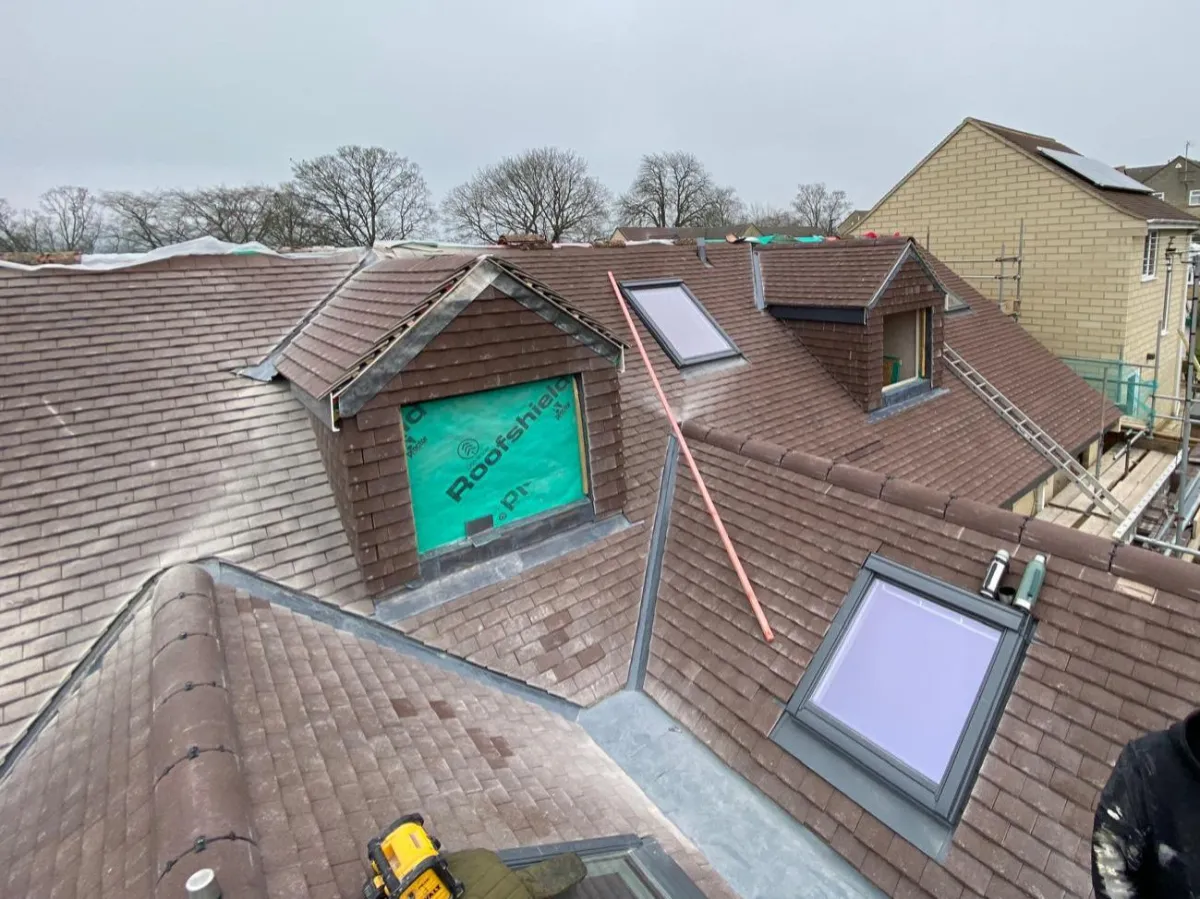 Pitch and tiled roofing restoration using regulated materials