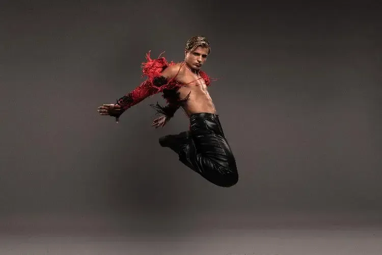 Promotional image for Supernova showing a dancer mid-performance, reflecting theatrical energy, movement, confidence and the vulnerability behind performance.
