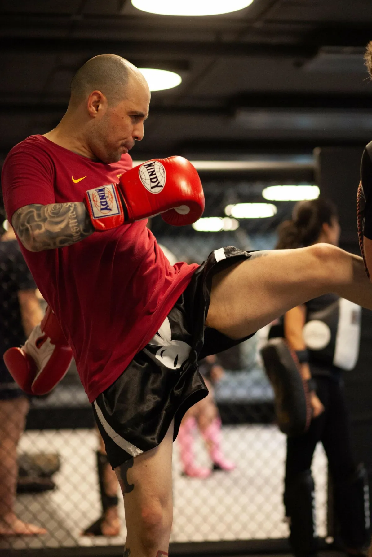 A woman on a treadmill in a gym
