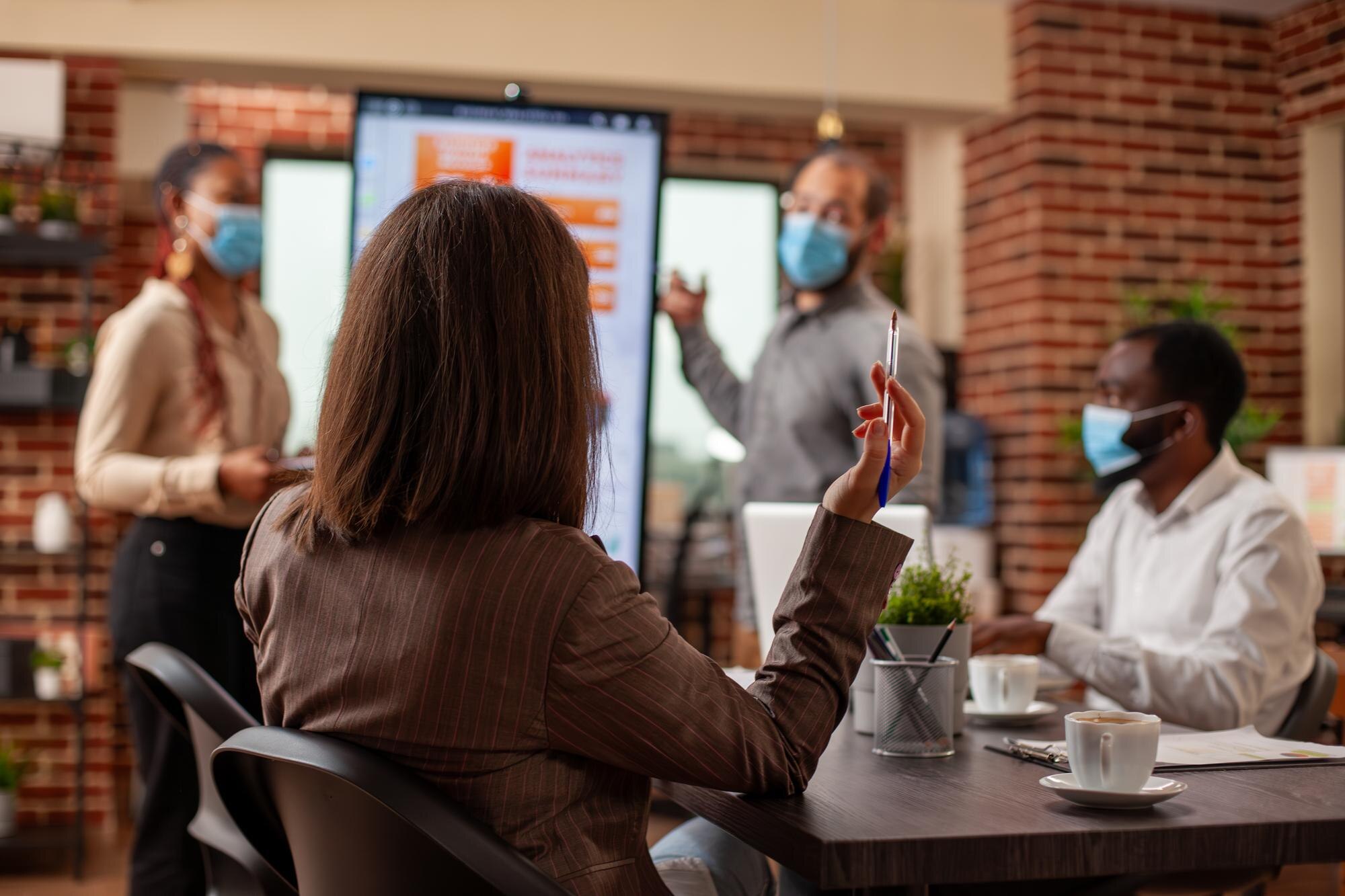 Featured image: Coworkers collaborating in office-18bd087ac2a630a75172