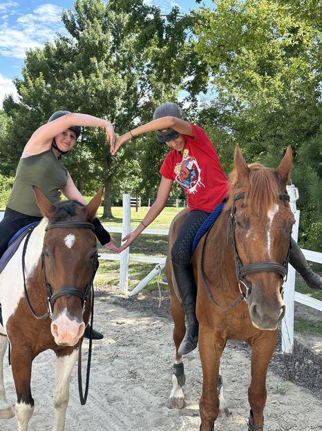 Kids riding horses at summer camp in Selma NC