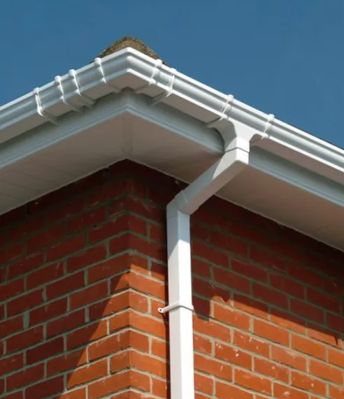 Newly installed fascias, soffits, and gutters on a home build in Brixham