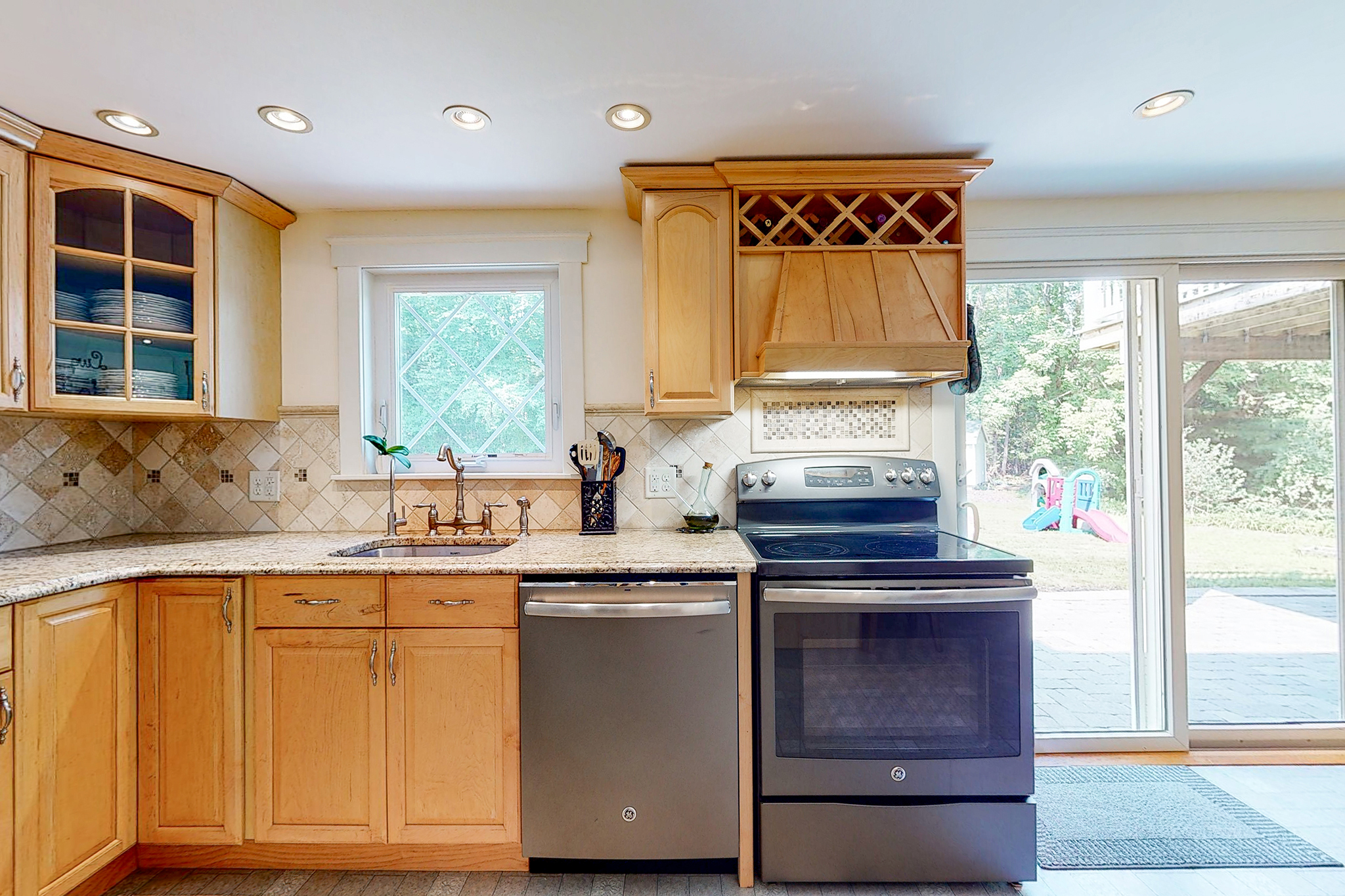 updated kitchen interior with new countertops and appliances