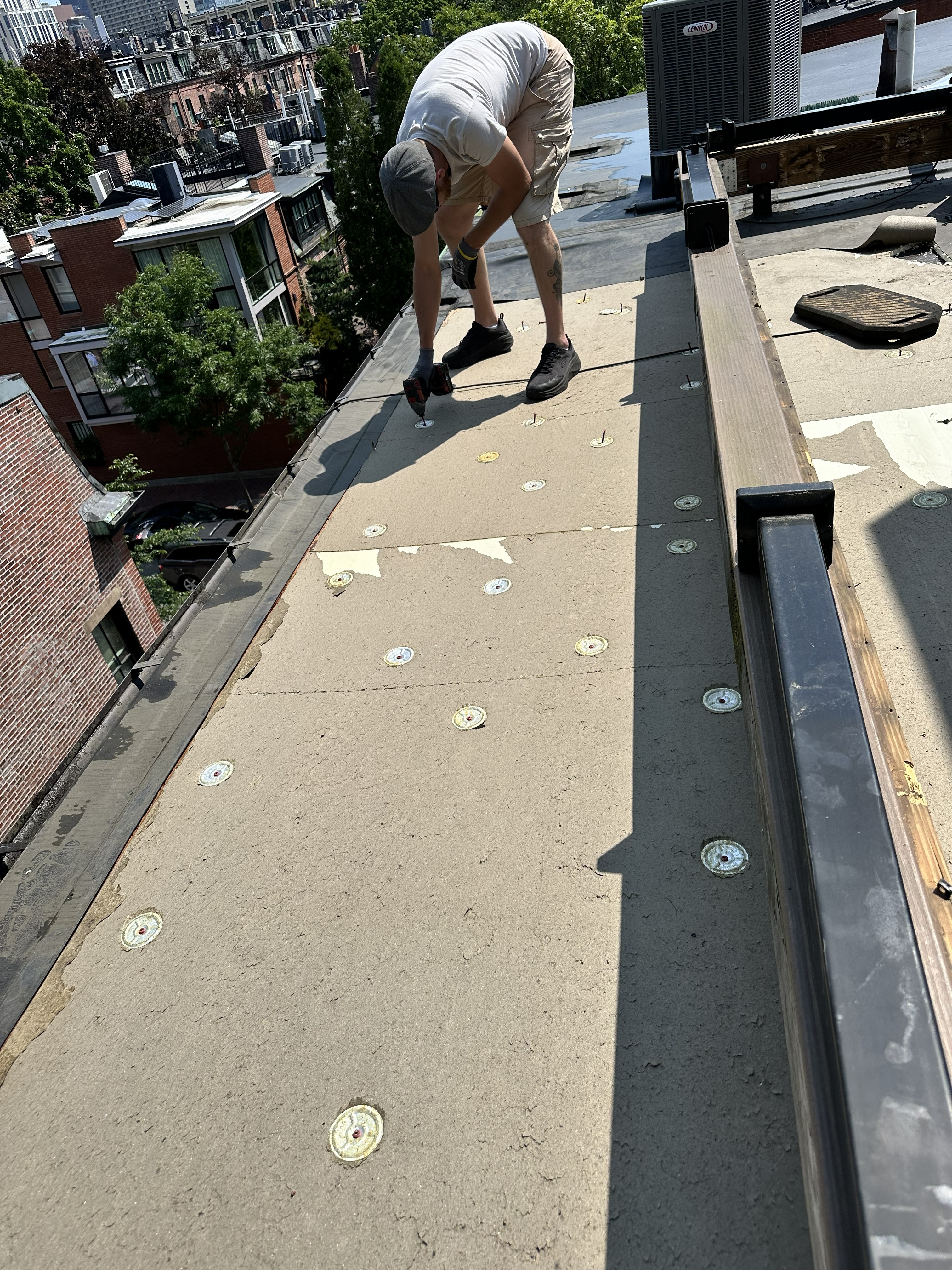 flat roofing replacement for home in cambridge, ma