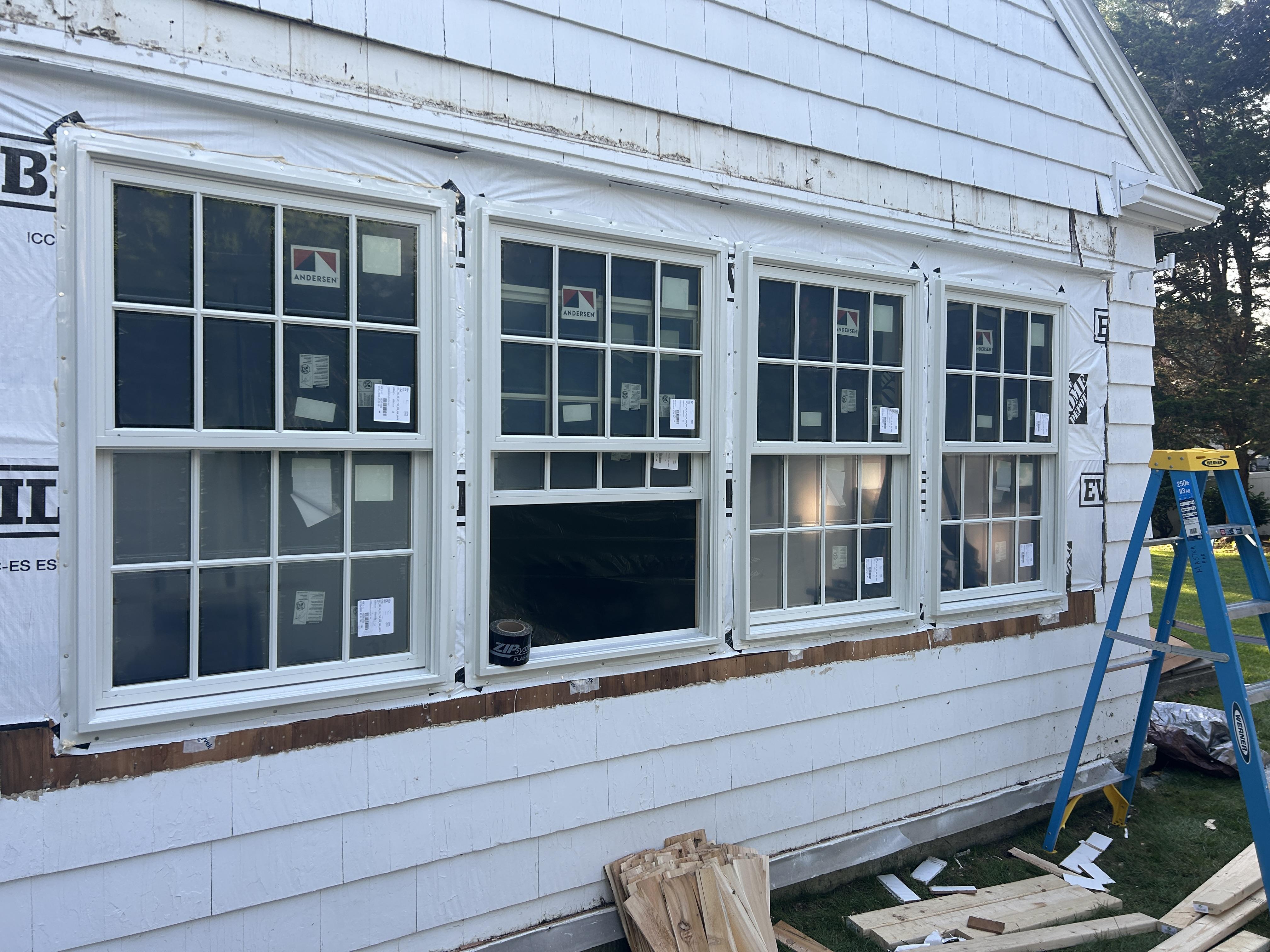 close-up of restored wood window with new glazing compound