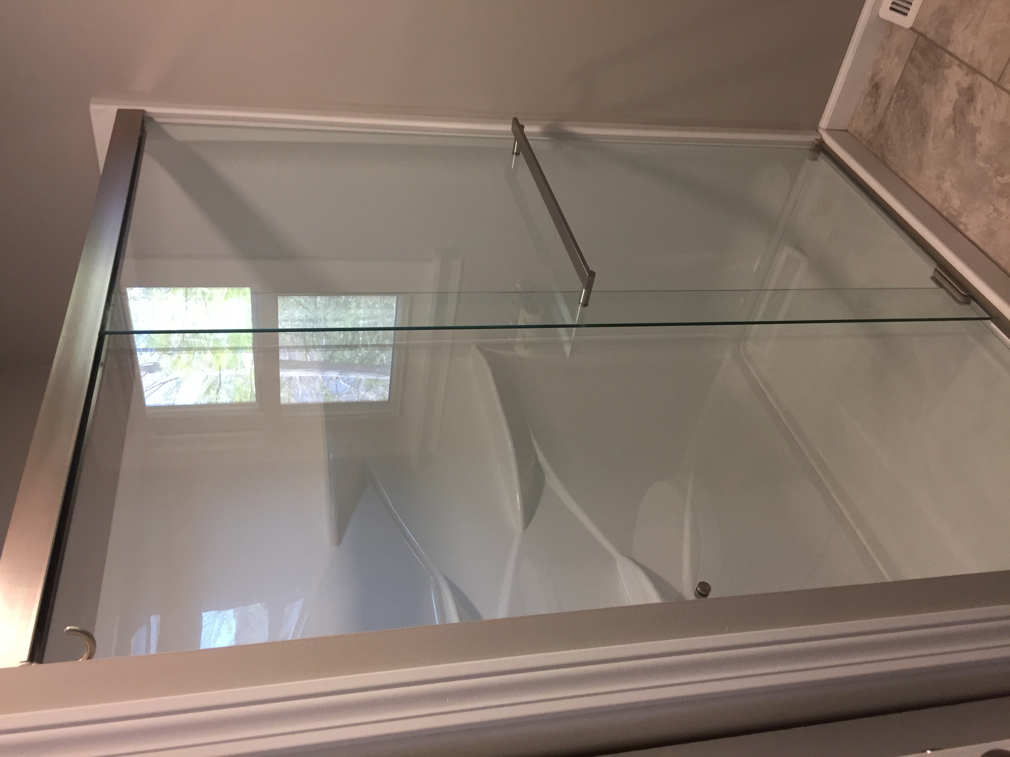 bathroom interior with new flooring, fixtures, and finishes