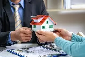 a modern house with a walkway leading to the front door