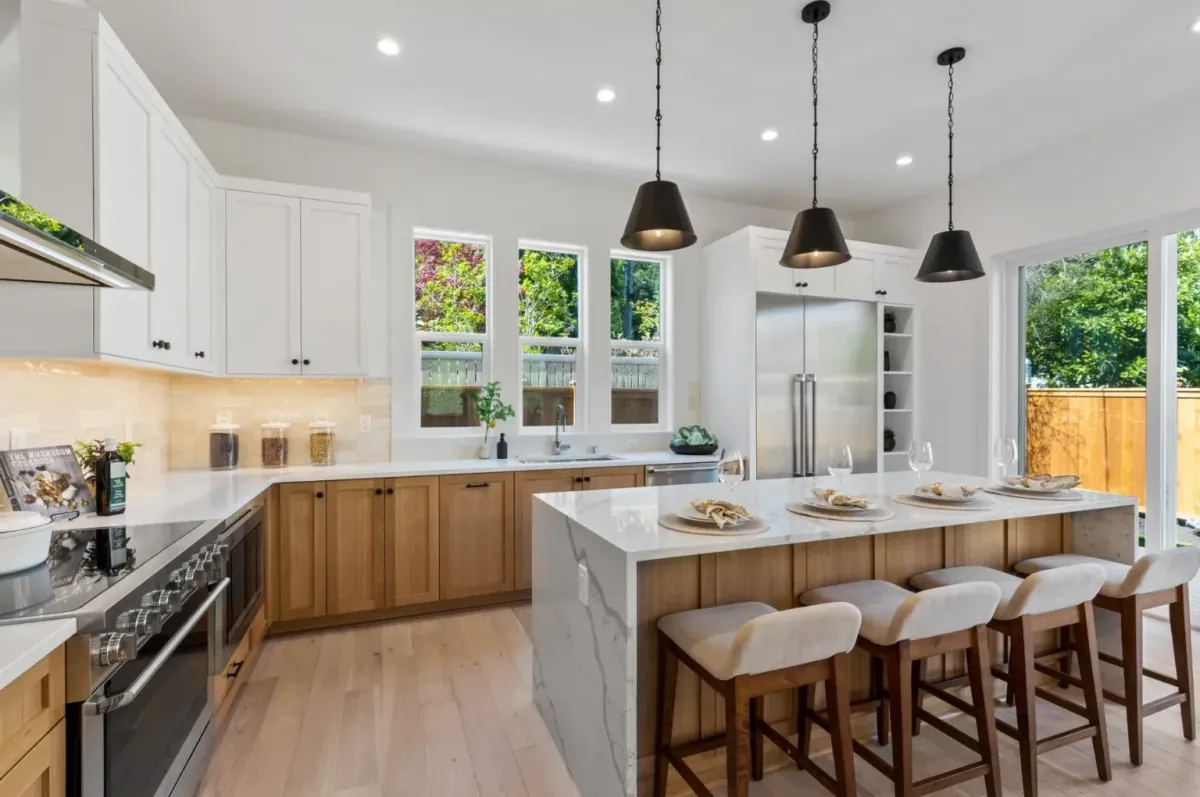 Custom wood cabinetry and built-in storage in a remodeled kitchen.