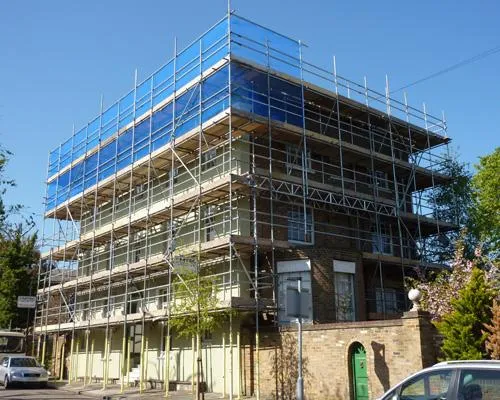 Commercial building under construction with scaffolding