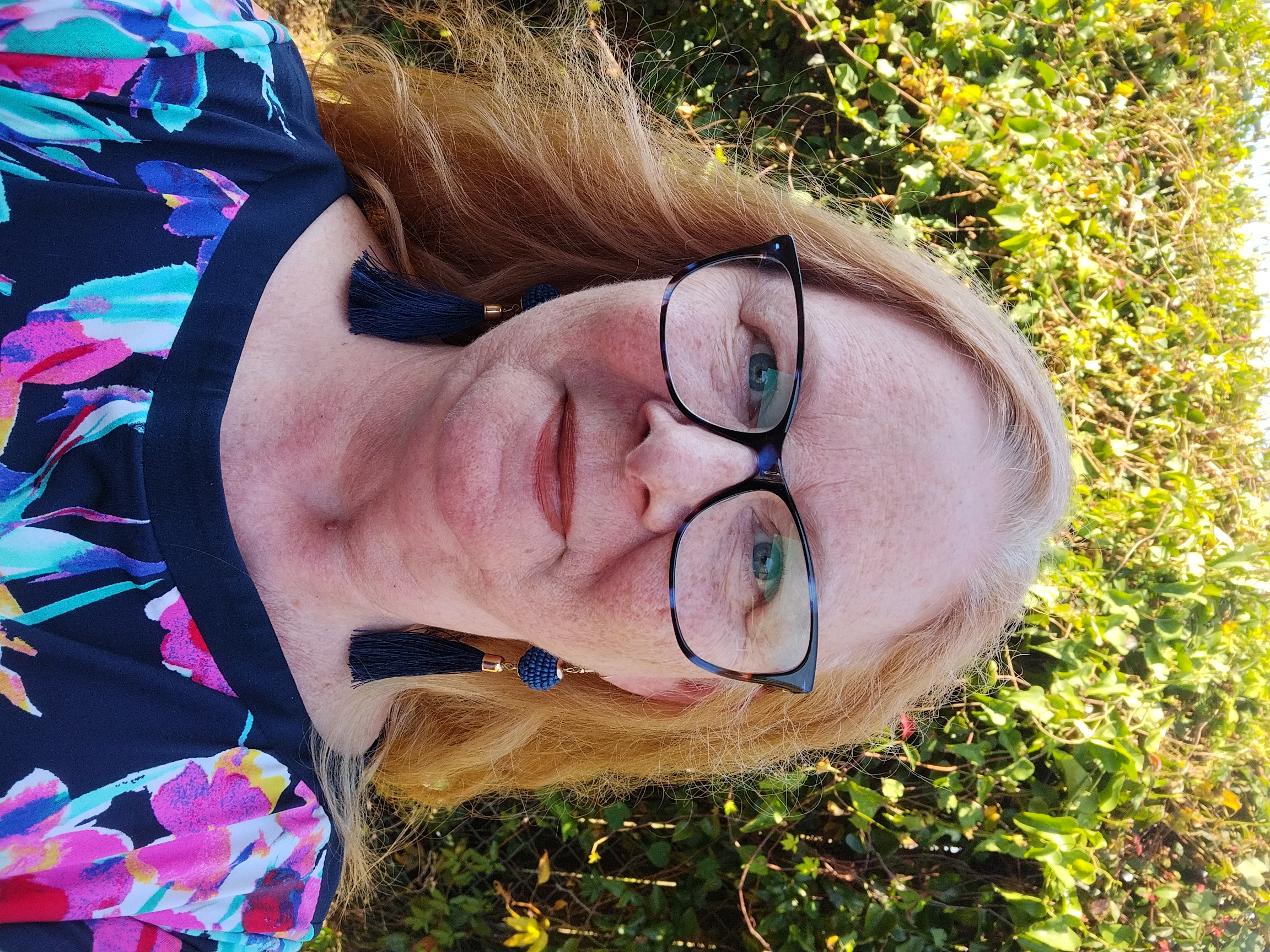 Confident Christian woman, half-body portrait with soft, hopeful expression