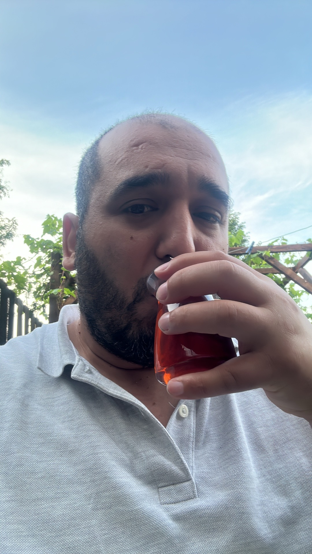Osman Okumus enjoying a glass of tea