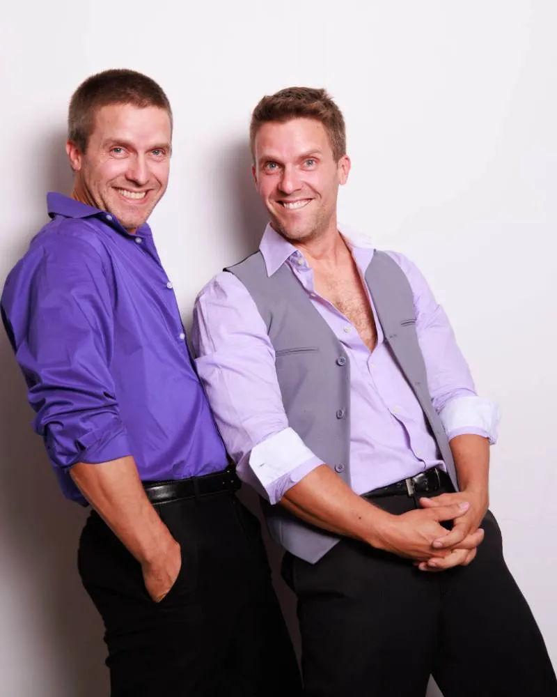 Jon and Chris Kelly, the Kelly Twins, smiling side by side