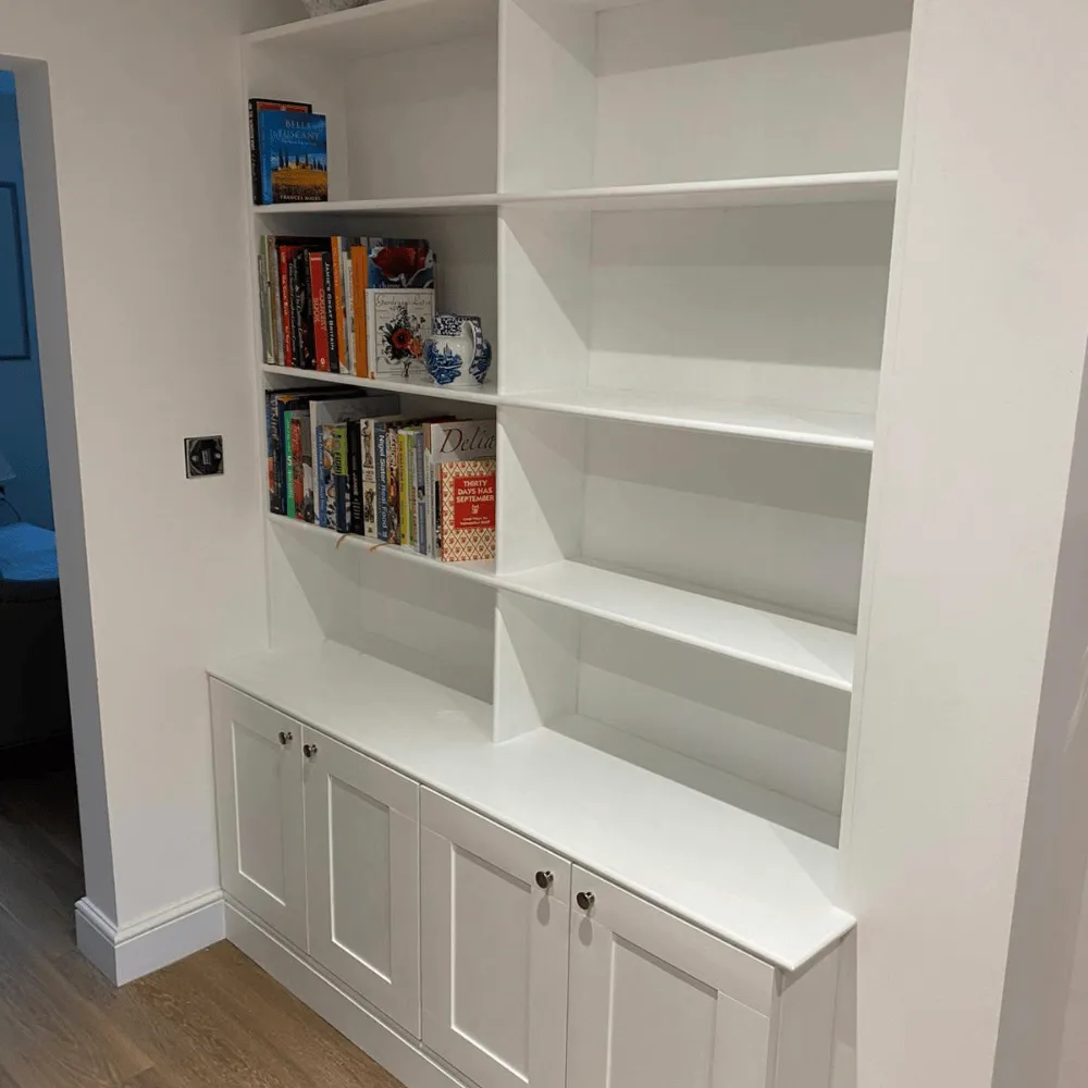 White wooden custom fitted shelving that we fitted in Tunbridge Wells