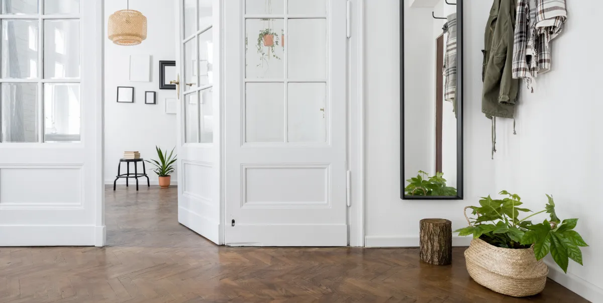 Custom kitchen renovation with new cabinetry, countertops, lighting, and open layout design