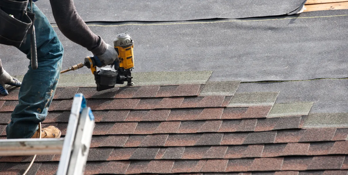 Custom kitchen renovation with new cabinetry, countertops, lighting, and open layout design
