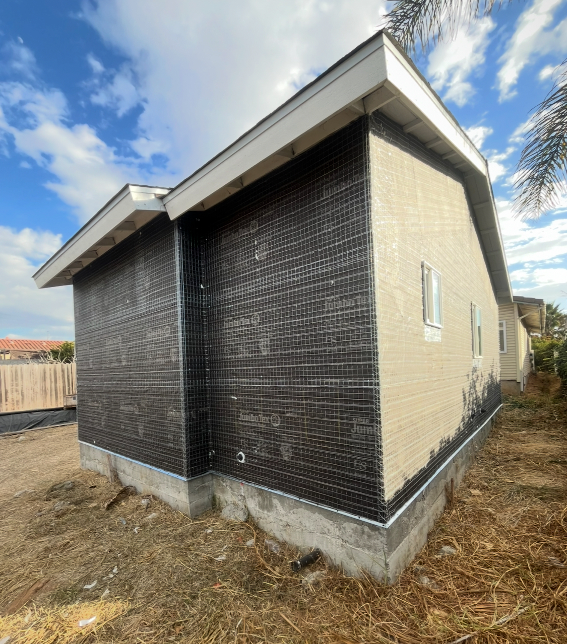 stucco home after restoration